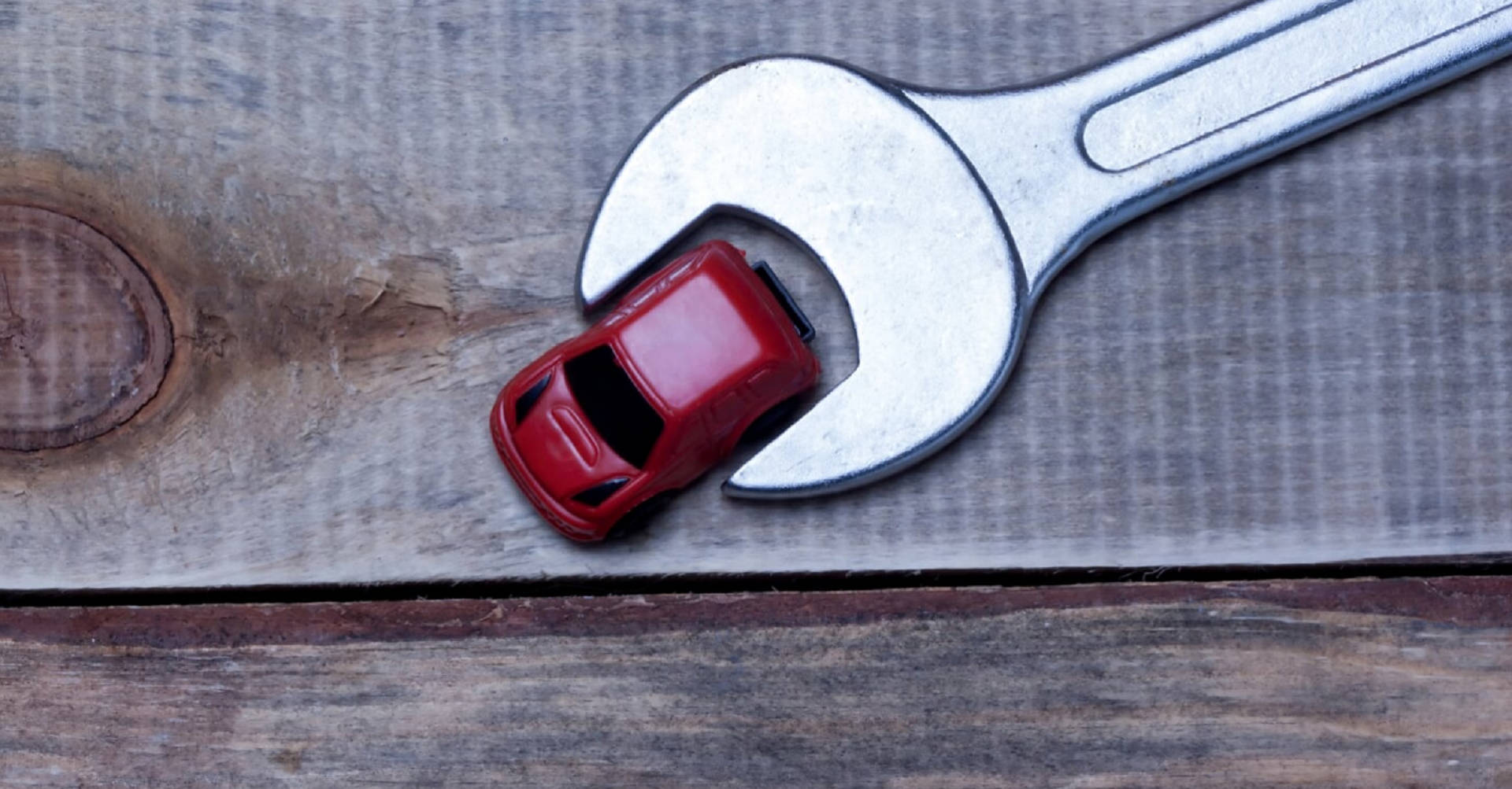 spanner or wrench and toy car