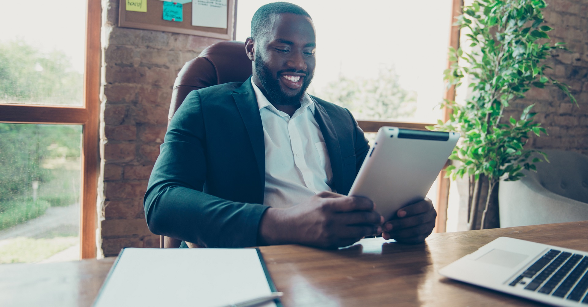 man sitting at desk