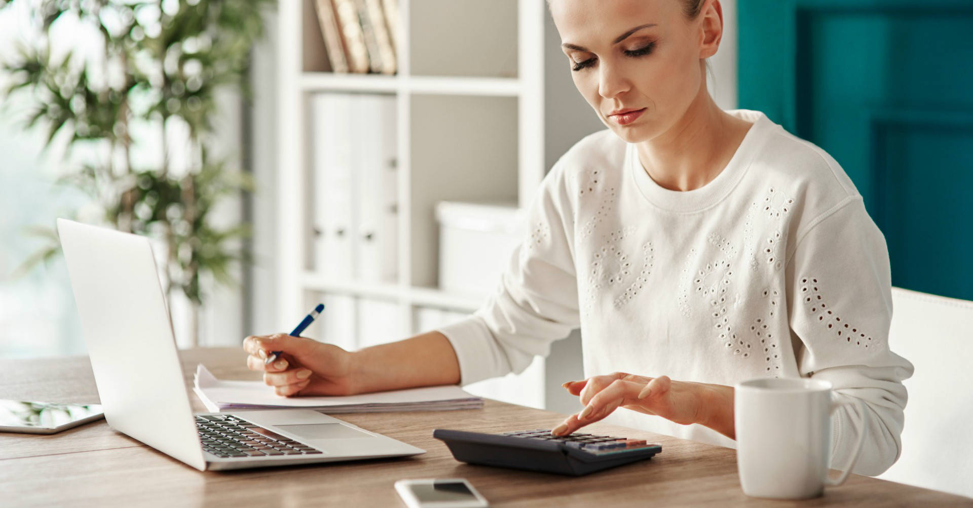 Businesswoman using laptop