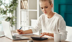 Businesswoman using laptop