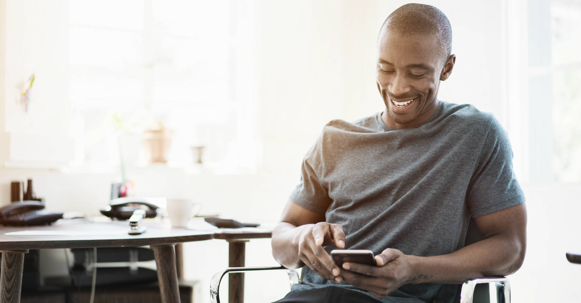 man smiling tablet