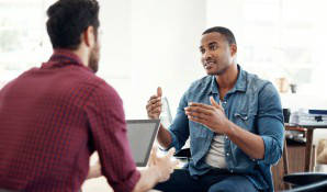 two gentlemen sitting