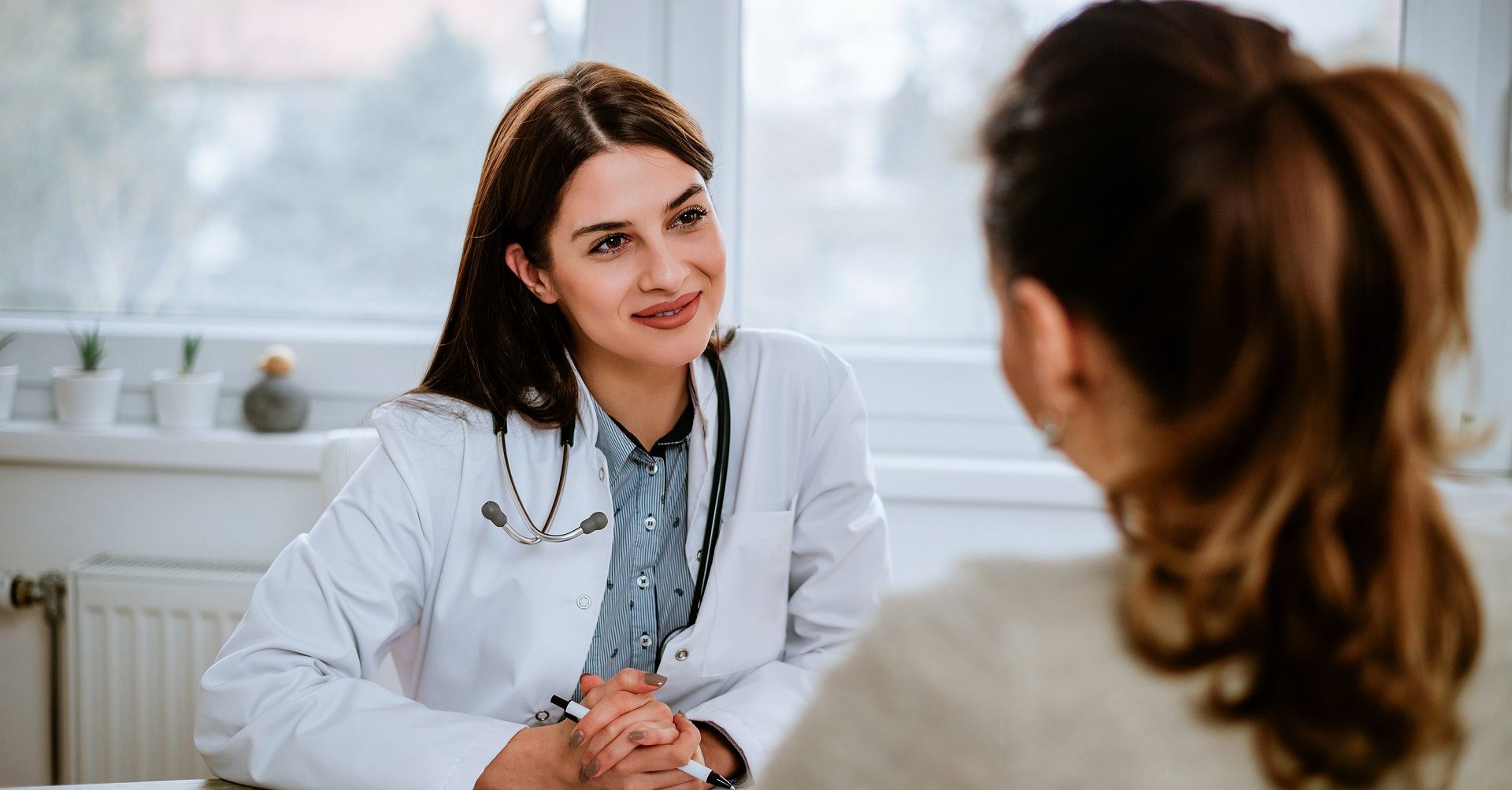 Woman talking to her doctor