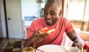 man eating breakfast