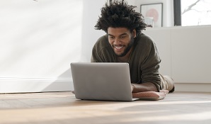 man looking at laptop