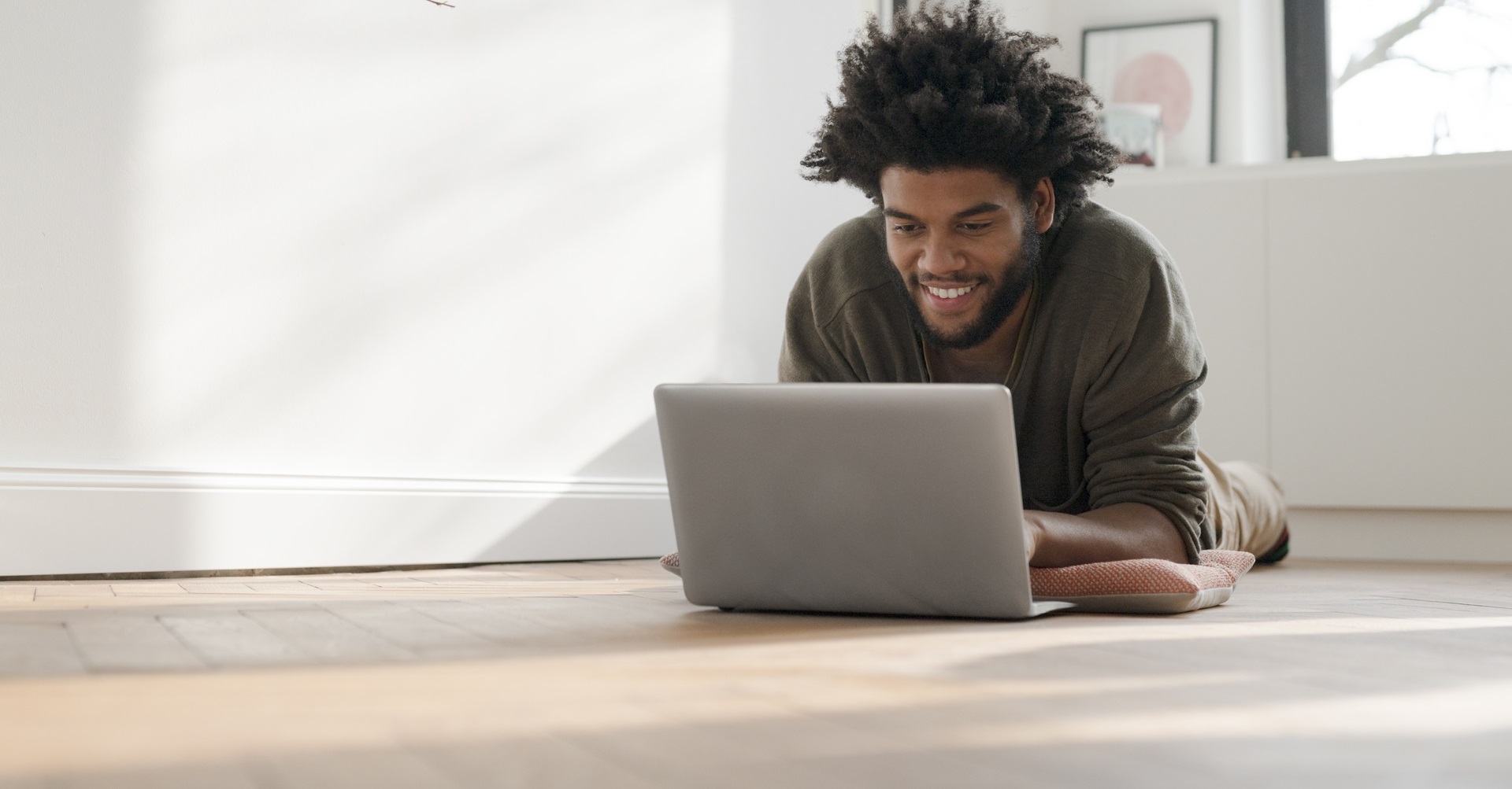 man looking at laptop