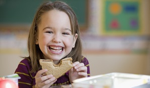 little girl eating lunch