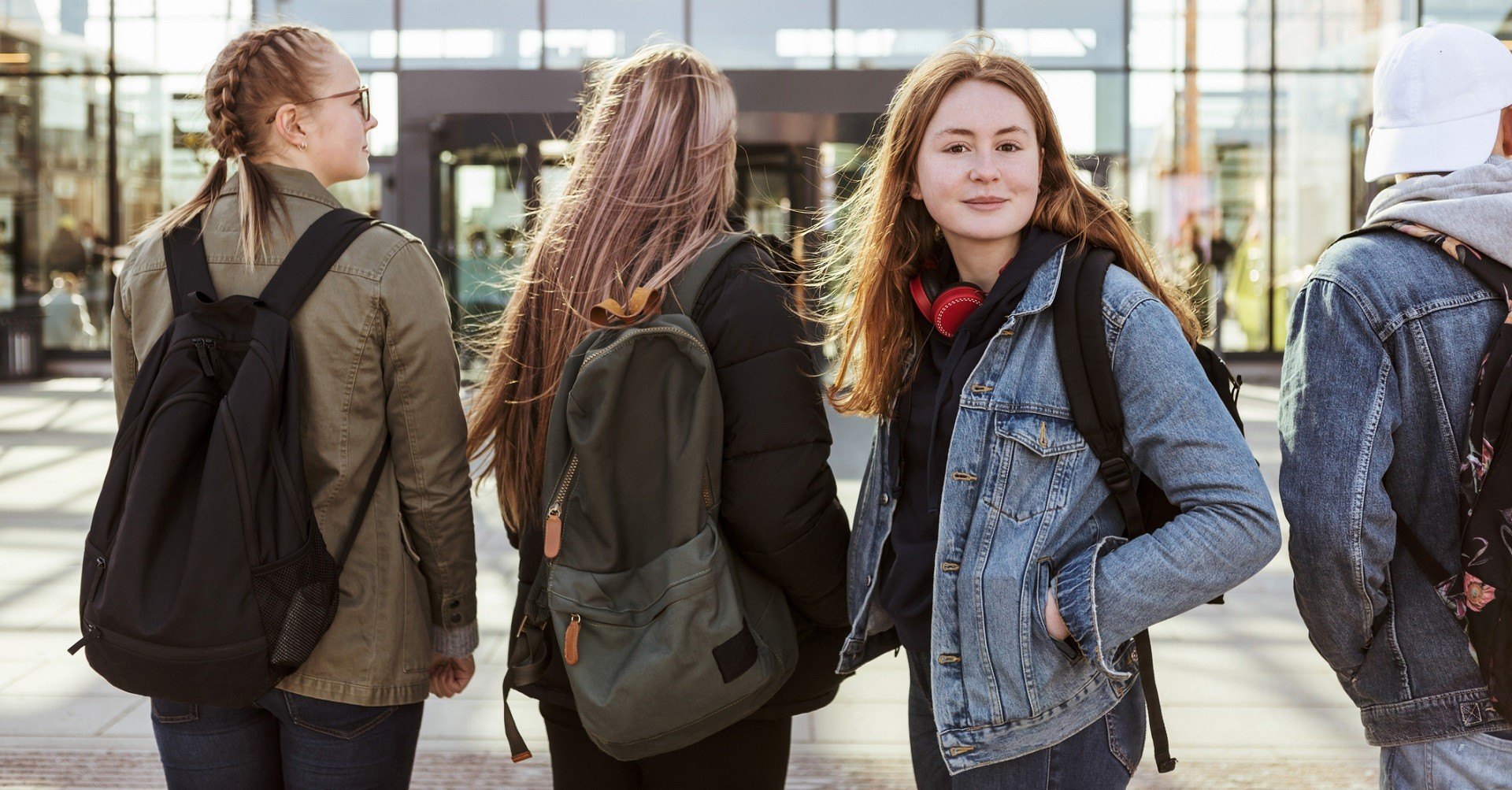 Teenagers standing in a line