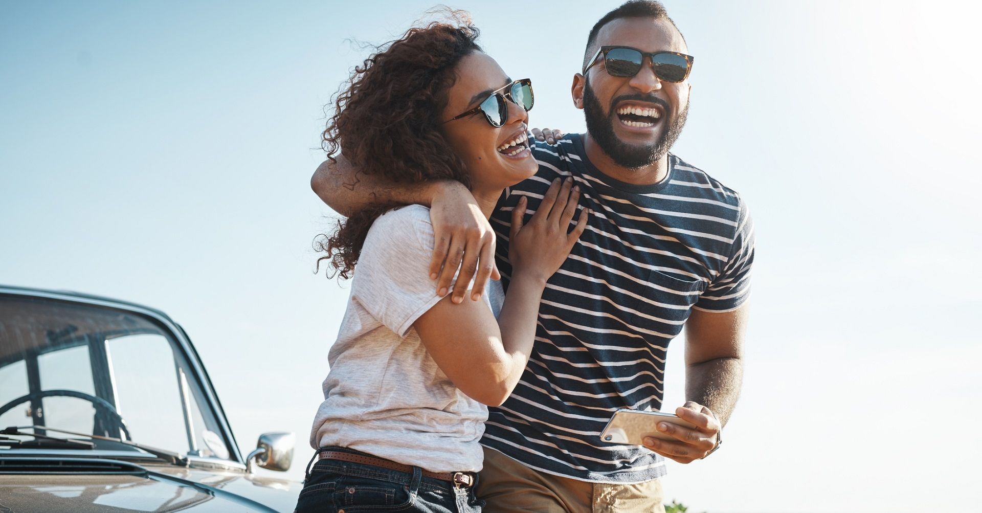 Couple in the sun taking selfie