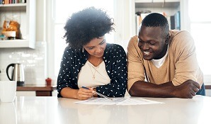 couple looking at budget