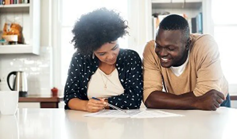 couple looking at budget
