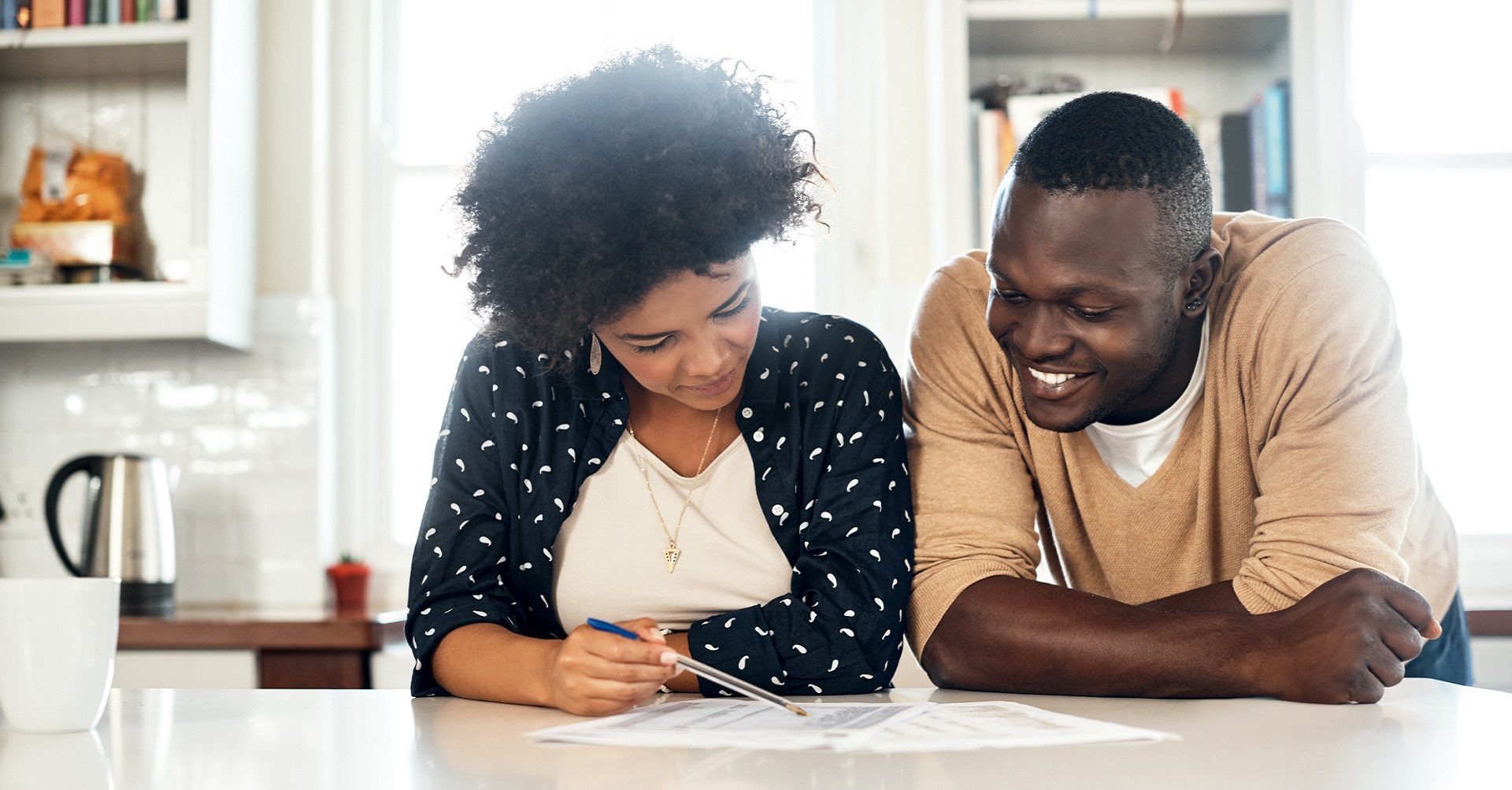 couple looking at budget