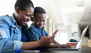 Mother and son looking at apps