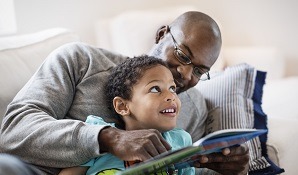 father and son reading