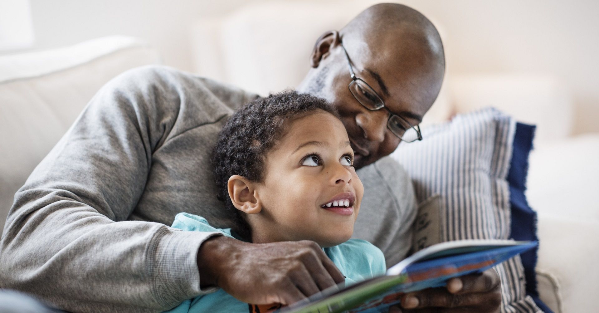 father and son reading