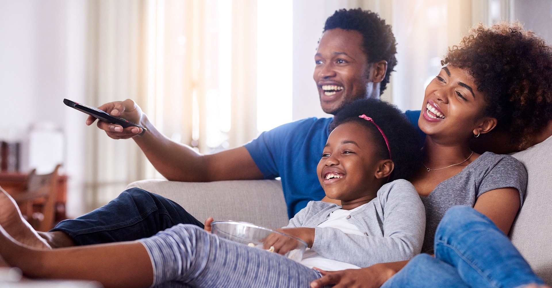 Family watching TV together