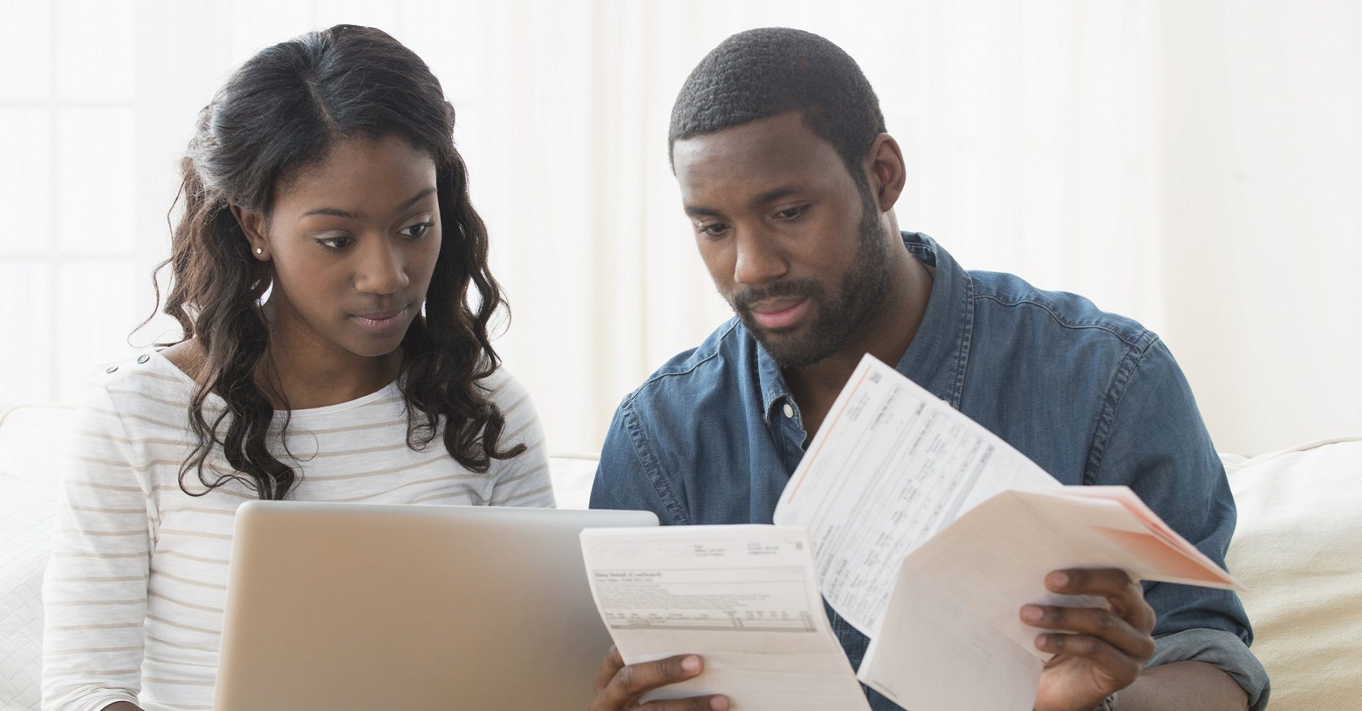 Couple looking at documents together