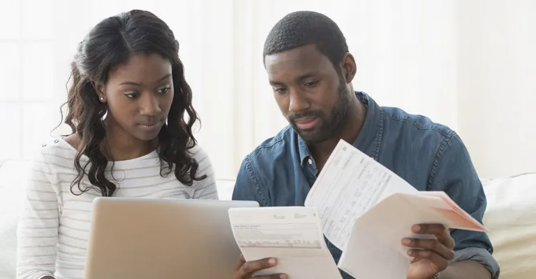 Couple looking at documents together
