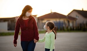 mother and daughter walking