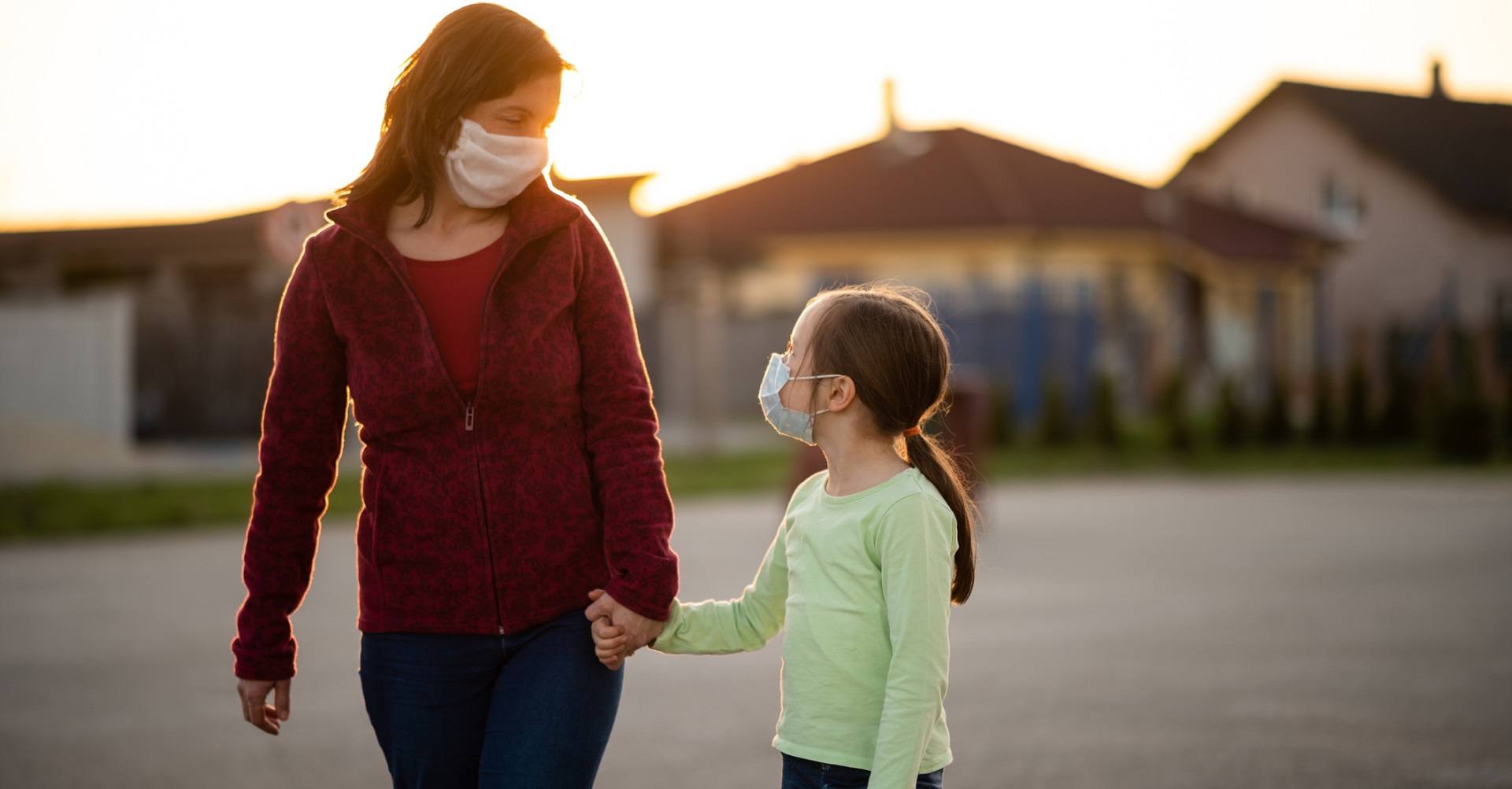 mother and daughter walking