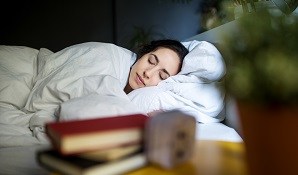 Woman sleeping in bed