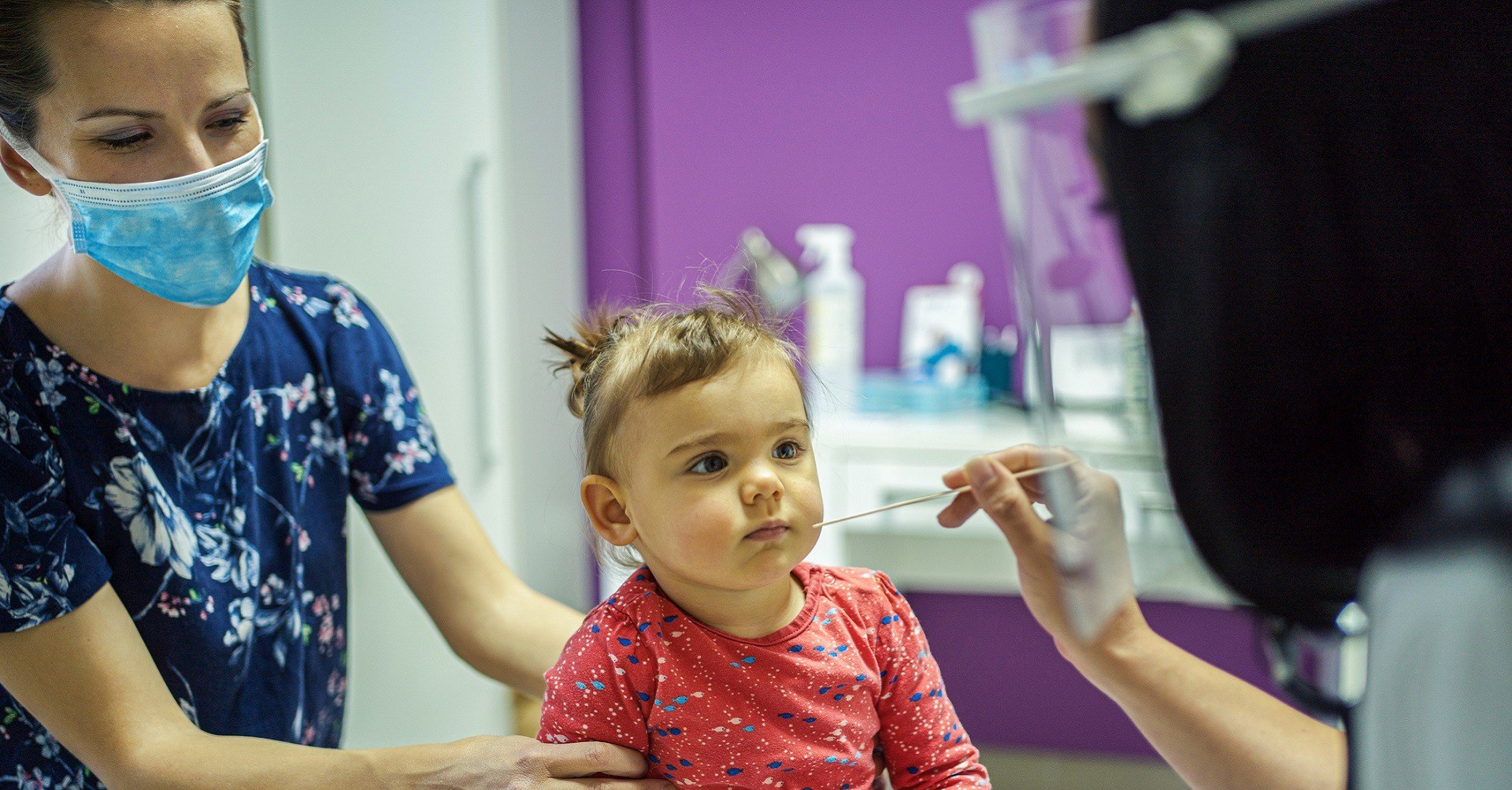 Child at doctor with mother