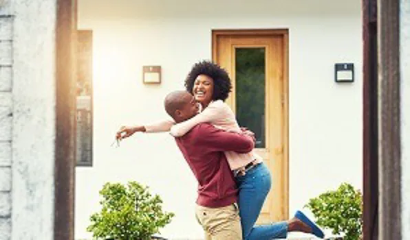 Couple celebrating new house