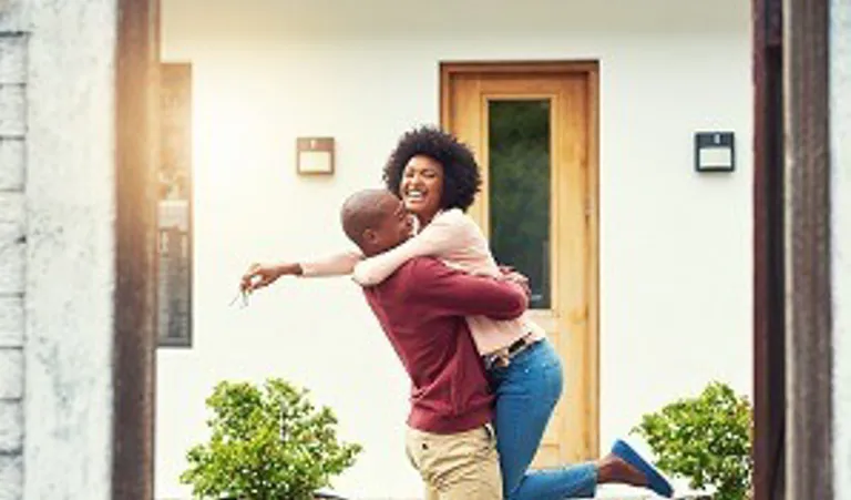 Couple celebrating new house