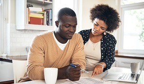 Couple looking at laptop