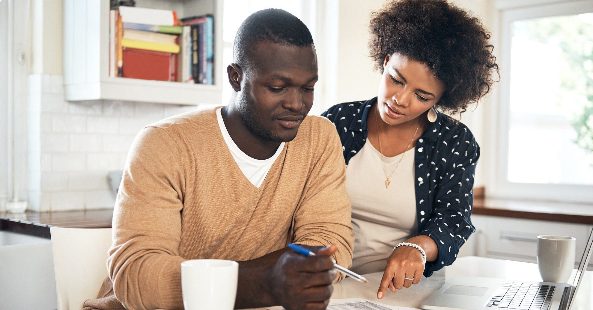 Couple looking at laptop