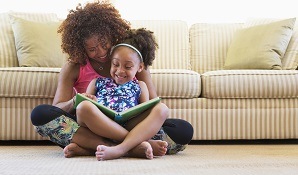 Mother and daughter reading a book