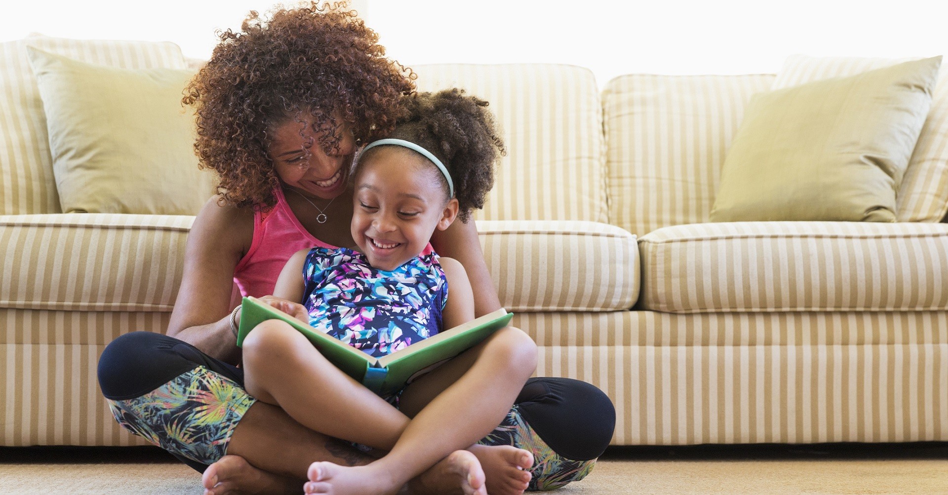 Mother and daughter reading a book