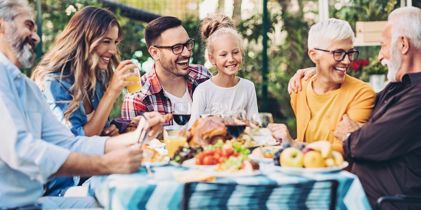 family laughing around a table