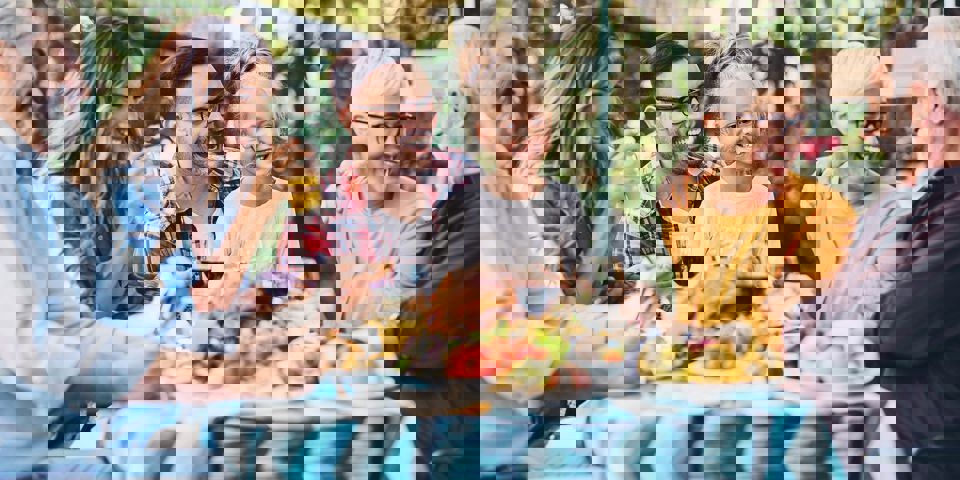 family laughing around a table