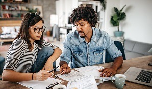 Couple looking at documents concerned