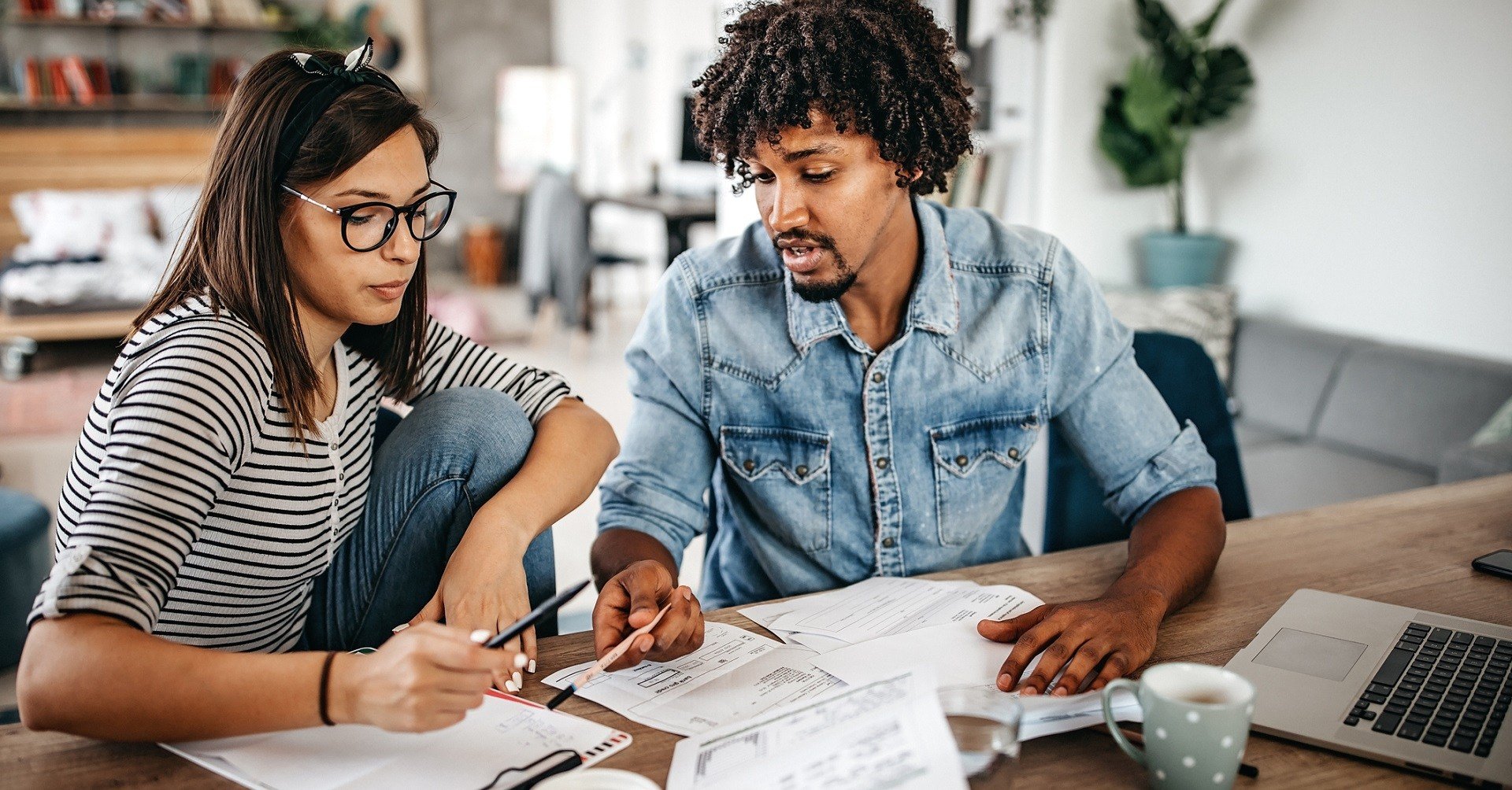 Couple looking at documents concerned