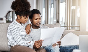 Couple looking at documents concerned