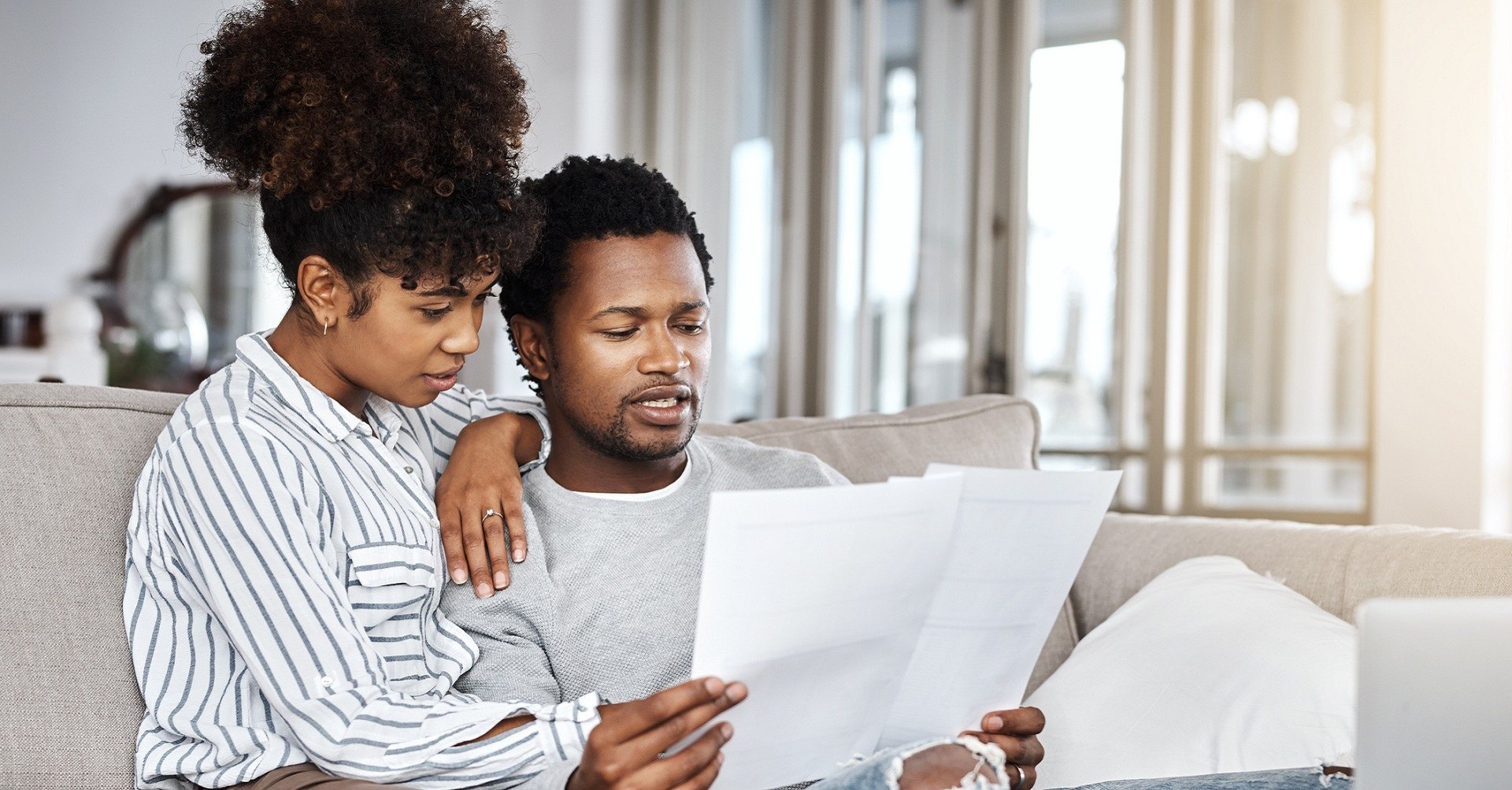 Couple looking at documents concerned