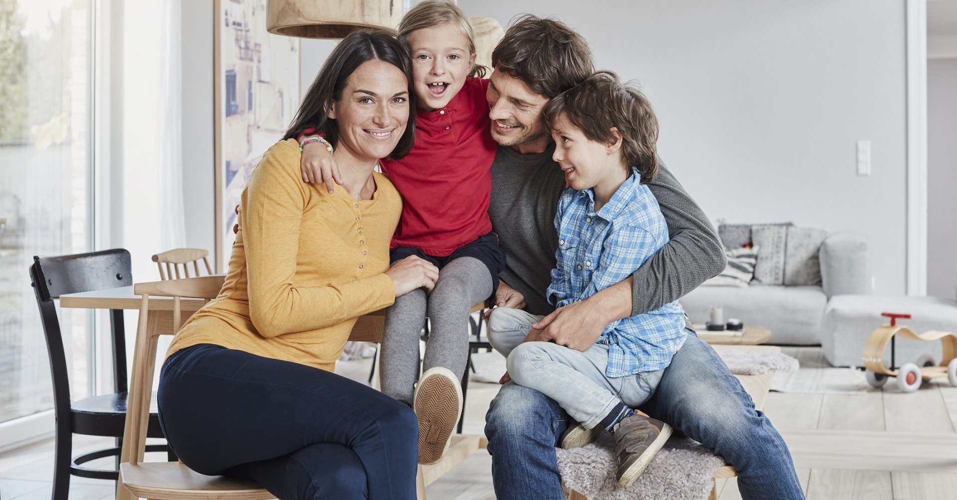 family sitting on couch