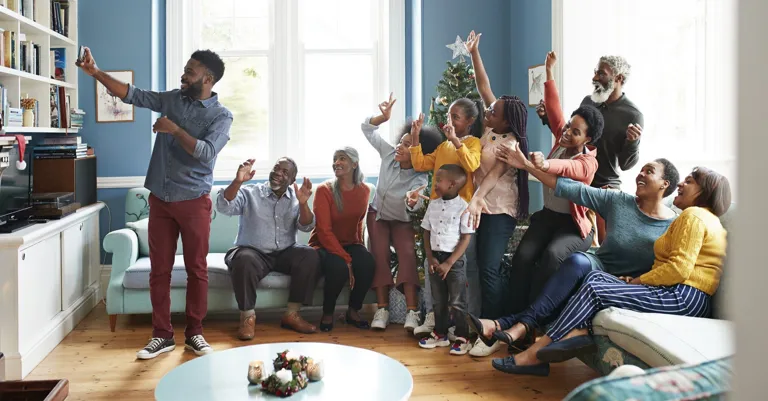 Family taking selfie at Christmas