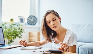 Woman working out finances