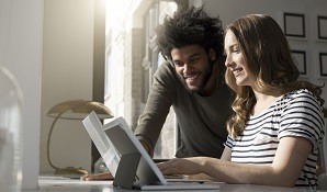 Couple looking at computer