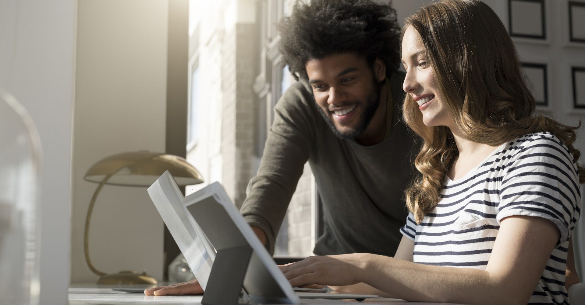 Couple looking at computer