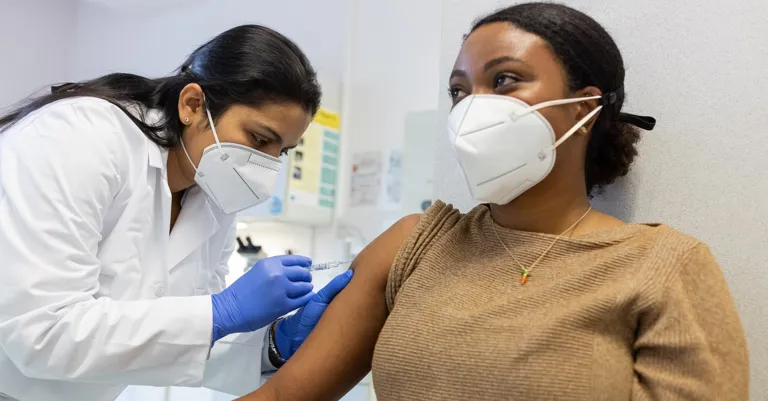 Woman getting vaccination