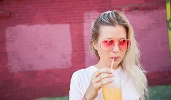 Woman drinking healthy drink