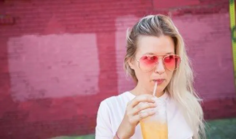 Woman drinking healthy drink