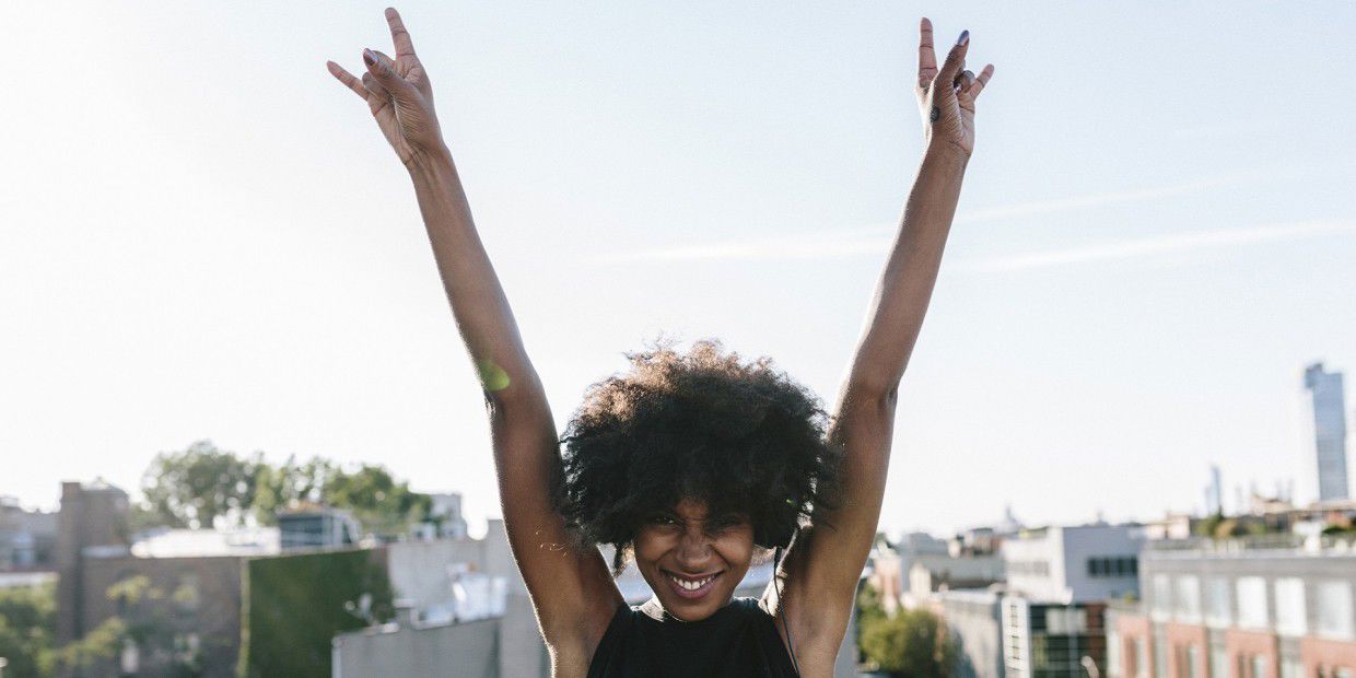 Woman with arms in the air