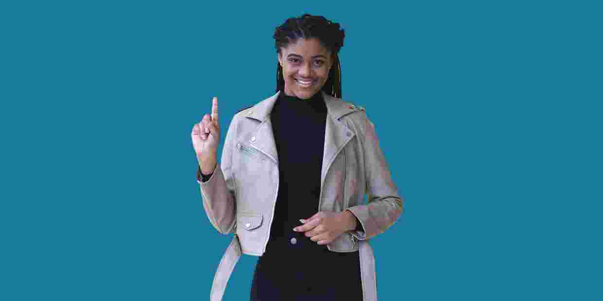 Woman holding up her finger, counting