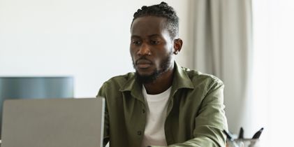 man using laptop