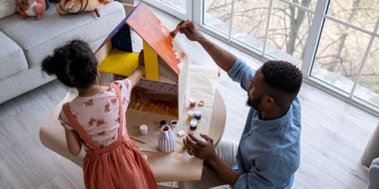 father and daughter working together